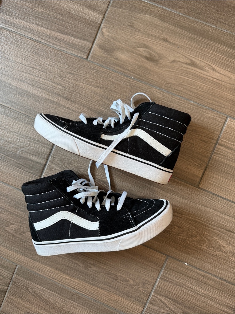 Vans Black and White High-Top Skate Sneakers